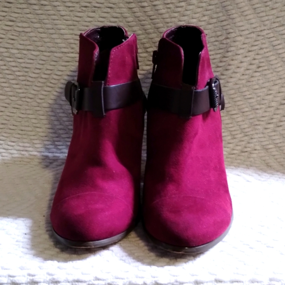 Carlos Santana hot pink short heel boots.